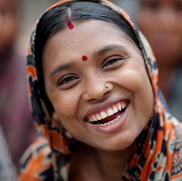Face of a woman from India with a bright wide Smile